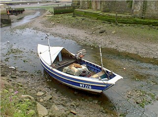 A 'modern' Yorkshire Coble in the beck at Staithes