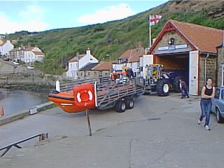 The Staithes Lifeboat being brought out of the Lifeboat Station