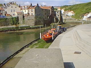 The Staithes Lifeboat going down the slipway