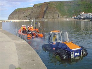 A lifeboat training session in the water